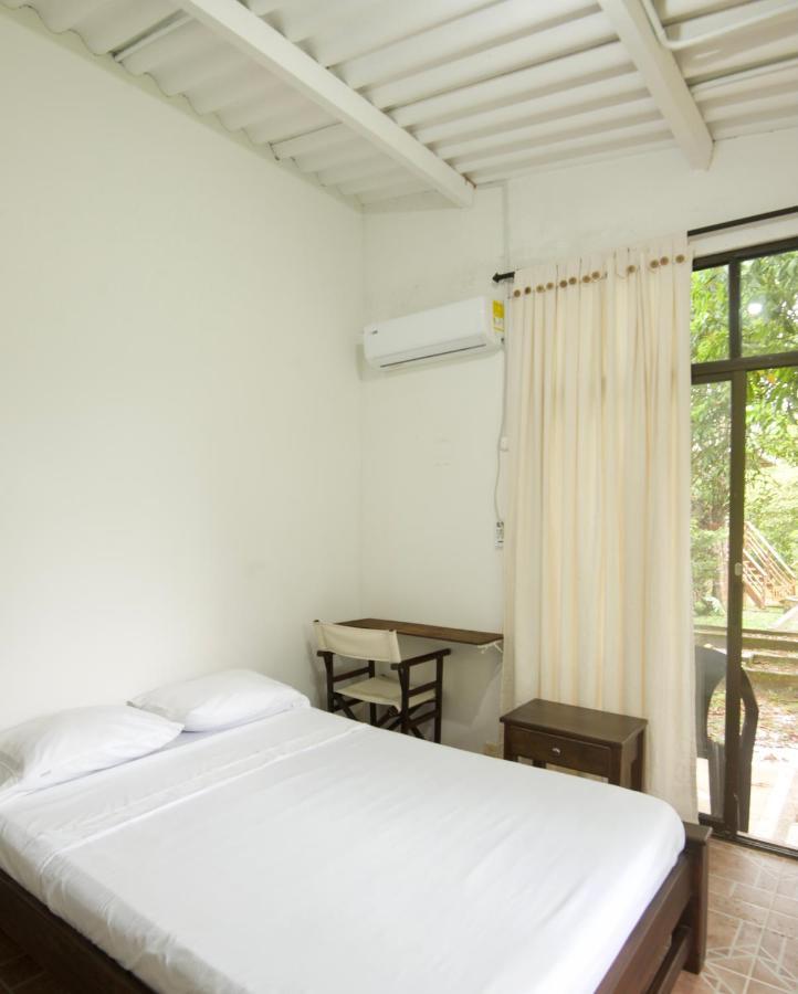 Hostal Suna Vito Puerto Asis Exterior photo
